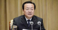 新疆维吾尔自治区党委原副书记李鹏新  严重违纪违法被开除党籍和公职
