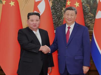 习近平同朝鲜劳动党总书记、国务委员长金正恩举行会谈